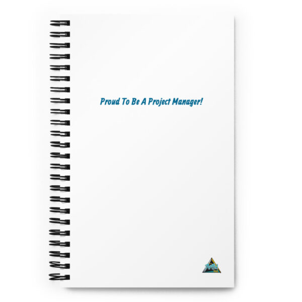 A spiral notebook with the words proud to be a project manager printed on it.